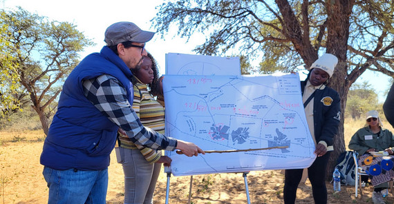 man presenting on a flipchart