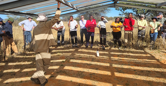 group of people visiting a farm