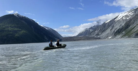 Exploring the bay by rubber dinghy.