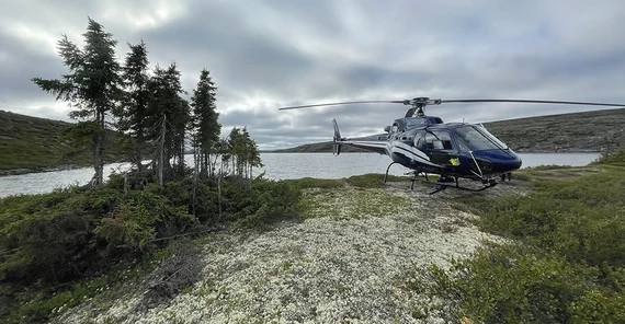 By helicopter through the Canadian Arctic.