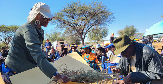 man testing grass samples