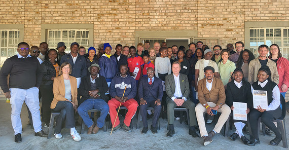 group of people posing for group photo