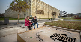 Two students at the university campus golm